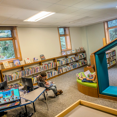 Completed 2020 Project R.E.A.D. Youth Library Renovation - Young patrons enjoying the new space!