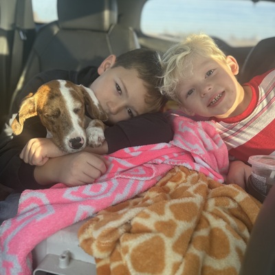 Max and Carson with their beloved pup!