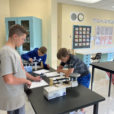 New science tables in science classrooms, including standing height tables.
