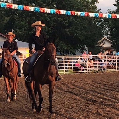 Saddle club members riding in the grand entry
